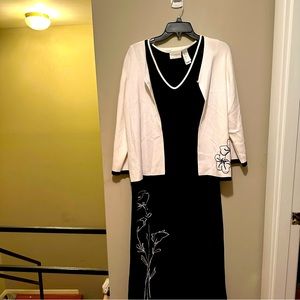 This two piece Liz Claiborne is a classic. Jacket is different size from dress.